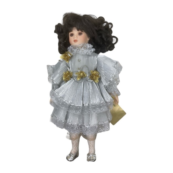 Porcelain Brunette Doll in Silver Ensemble ( Seymour Mann)